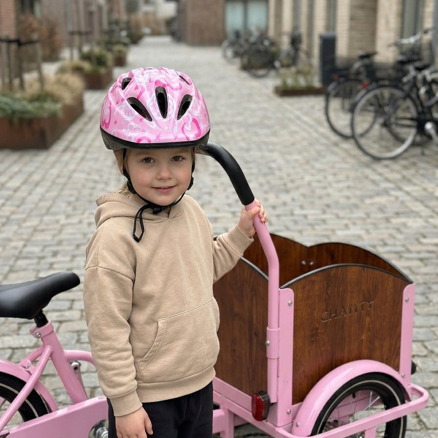 Kask dziecięcy Chanty – Różowy z serduszkami